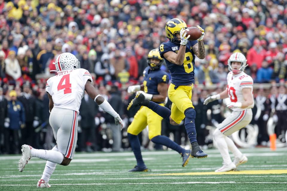 Michigan wide receiver Ronnie Bell makes a catch against Ohio State during the first half at the Michigan Stadium in Ann Arbor, Saturday, Nov. 30, 2019.