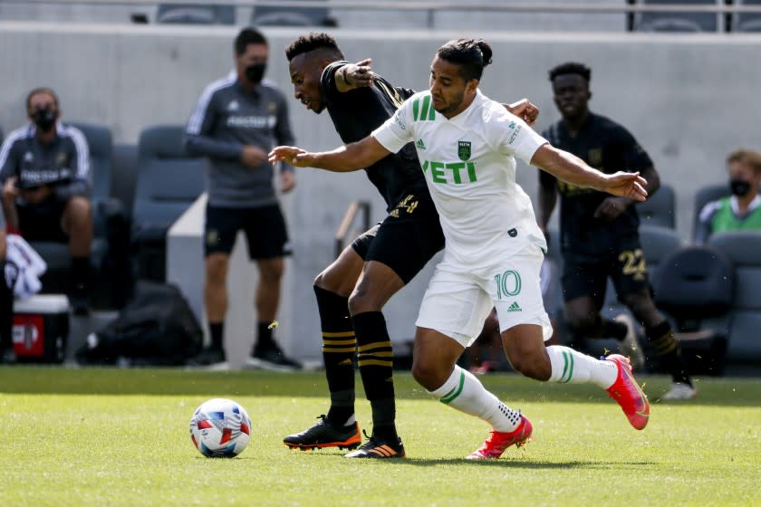 Austin FC midfielder Cecilio Dominguez (10) and Los Angeles FC midfielder Mark-Anthony Kaye.