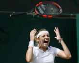 Timea Bacsinszky of Switzerland celebrates after winning her match against Monica Niculescu of Romania at the Wimbledon Tennis Championships in London, July 6, 2015. REUTERS/Stefan Wermuth