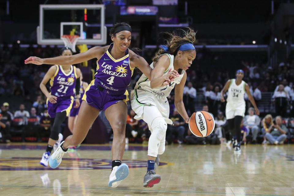 Sparks guard Lexie Brown pursues a loose ball alongside Lynx guard Moriah Jefferson.