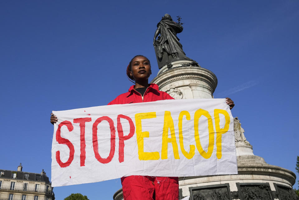 Climate activist, Patience Nabukalu, participates in a protest on the sidelines of the Global Climate Finance Summit in Paris, Friday, June 23, 2023. World leaders, heads of international organizations and activists are gathering in Paris for a two-day summit aimed at seeking better responses to tackle poverty and climate change issues by reshaping the global financial system. (AP Photo/Michel Euler)