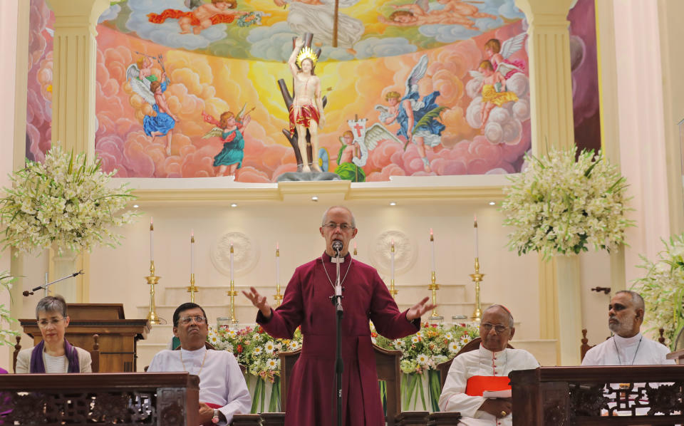 The Archbishop of Canterbury Justin Welby delivers a speech in memory of victims of the Easter Sunday attacks at St. Sebastian's church in Katuwapitiya village, Negombo , Sri Lanka, Thursday, Aug. 29, 2019. The figurehead of the Church of England visited the church in the seaside town of Negombo soon after he arrived on a three-day visit to Sri Lanka. More than 100 people died in the church in Negombo, known as "The Little Rome" for it dense Catholic population. A total of 263 people were killed when seven suicide bombers from a local Muslim group attacked three churches and three luxury hotels on April 21. (AP Photo/Eranga Jayawardena)