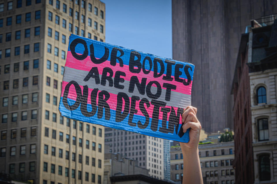 Participant seen holding a sign at the 2022 Queer Liberation March in NYC. / Credit: Erik McGregor/LightRocket via Getty Images