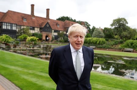 Boris Johnson, a leadership candidate for Britain's Conservative Party, looks on during his visit at Wisley Garden Centre in Surrey