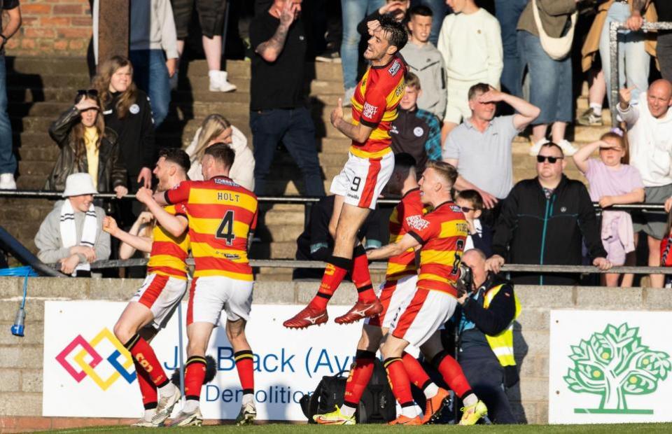 HeraldScotland: Partick Thistle&#39;s players celebrate Jack McMillan&#39;s opener in their romp over Ayr United.