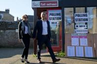 The modest background of London mayoral candidate Sadiq Khan (R) plays well in a city that is proud of its diversity and loves a self-made success story