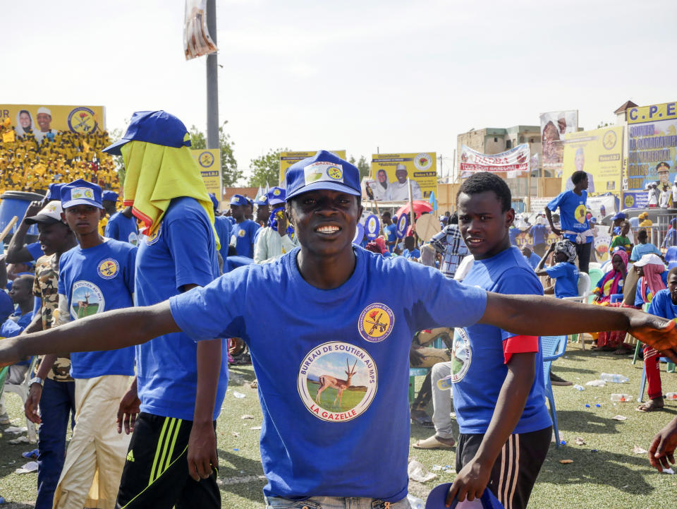 Supporters of Chadian President Idriss Deby Itno gather for a rally in N'djamena, Chad, Friday April 9, 2021. Deby is seeking to extend his three-decade long rule, running for a sixth time in this oil-producing Central African nation that is home to nearly half a million refugees and also plays a prominent role in the fight against Islamic extremism in the Sahel. (AP Photo/Joel Kouam)