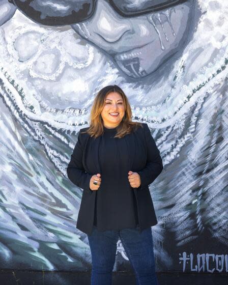 Jennifer Cuevas stands outside of Self Help Graphics & Art in Los Angeles on Thursday, Aug. 17, 2023.