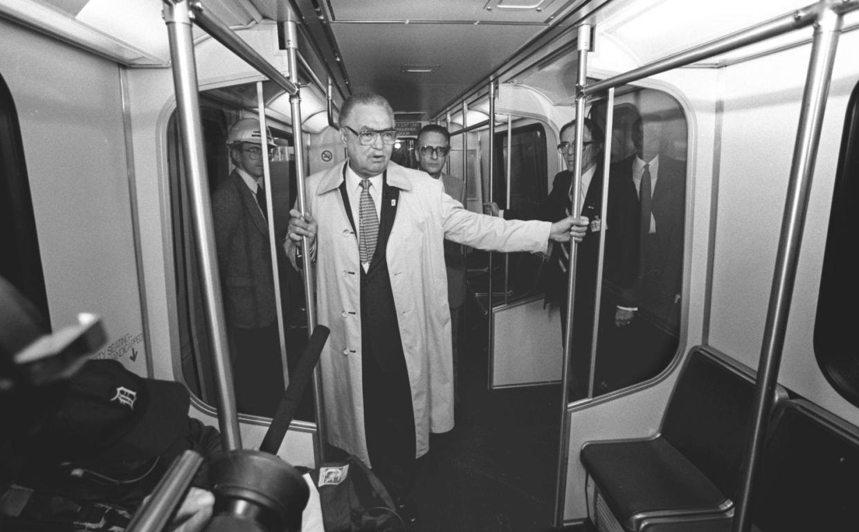 Detroit Mayor Coleman Young rides the People Mover in 1987 as they prepare to open it to the public.(AP Photo/Robert Kozloff)