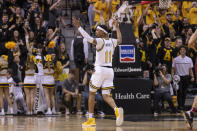 Missouri's Isiaih Mosley pumps up the crowd after he made a three point shot during the second half of an NCAA college basketball game against Iowa State Saturday, Jan. 28, 2023, in Columbia, Mo. Missouri won 78-61.(AP Photo/L.G. Patterson)