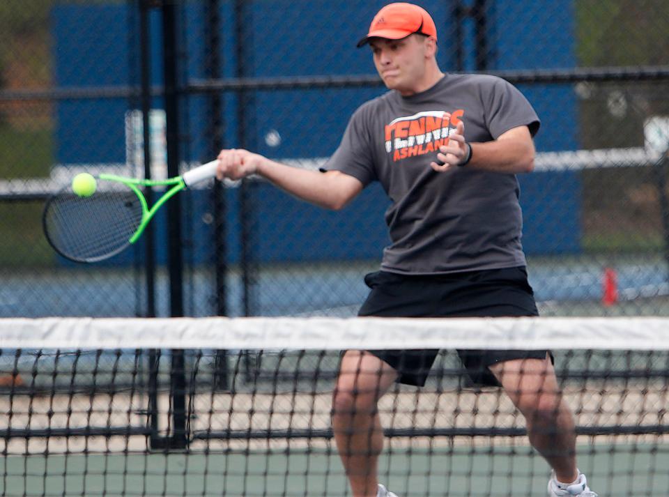 Ashland's Caedon Blough returns a shot during his first doubles match against Mount Vernon Thursday, April 28, 2022 at Brookside Park.