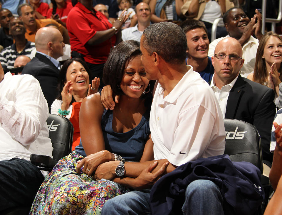 U.S. President Barack Obama and First Lady Michelle Obama on the Kiss Cam July 16, 2012. (Getty)