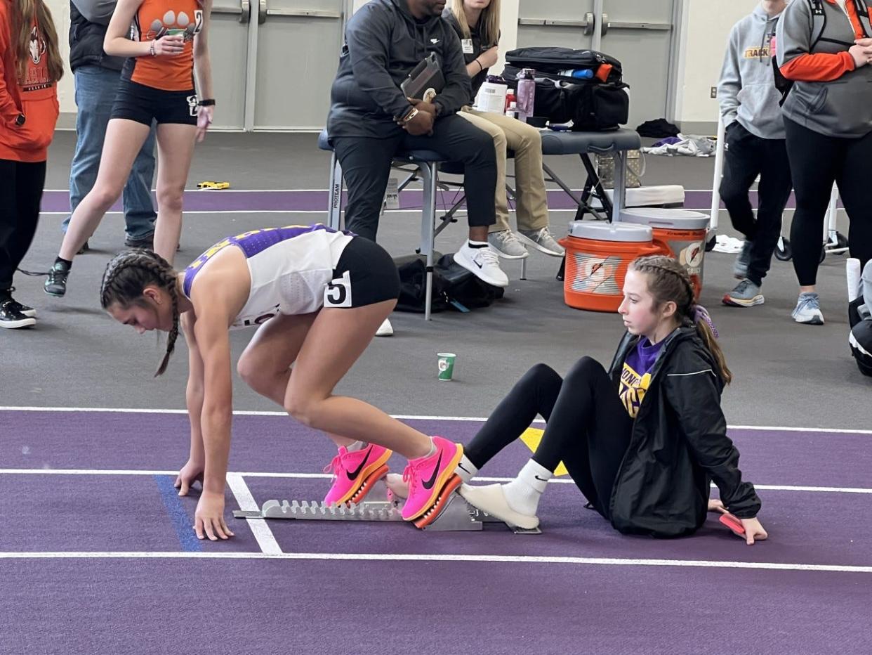 Hononegah freshman Kylie Simpson gets set to launch out of the starting blocks before winning the 400-meter run at the NIC-10 indoor meet in Rockton on Saturday, March 18, 2023.