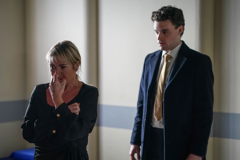 Sharon Watts remained in a police cell as Johnny tried to help her during Tuesday's EastEnders episode