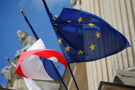 French and European flags fly on the facade of city hall in Amiens, France, May 16, 2019. Picture taken May 16, 2019. REUTERS/Pascal Rossignol