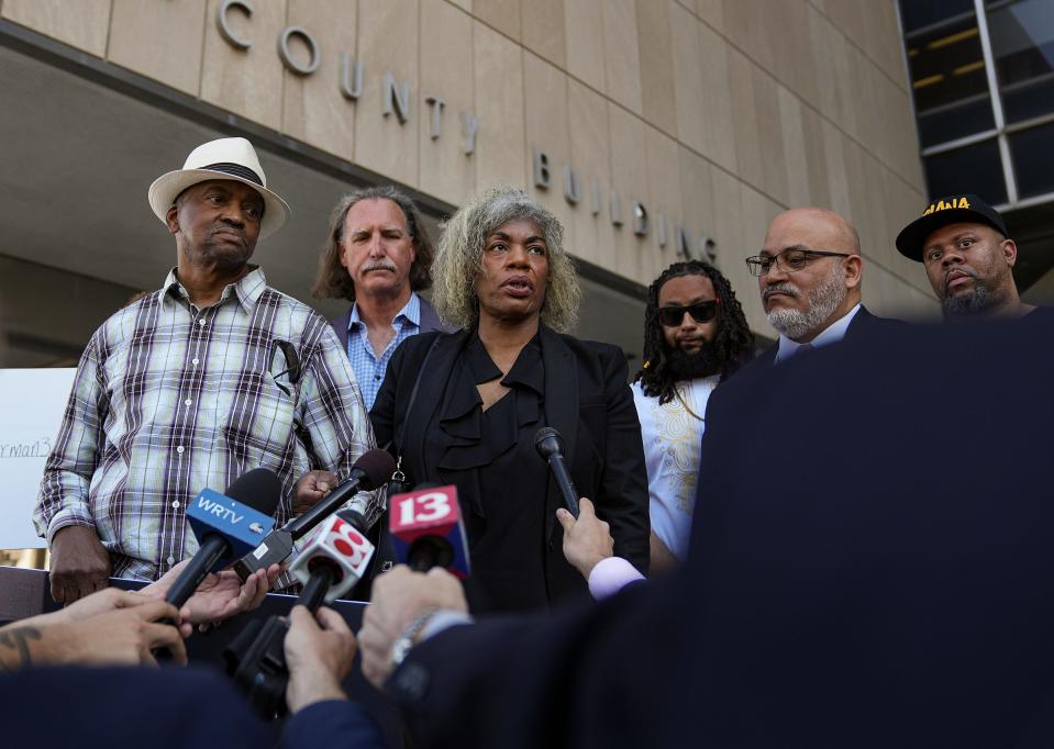 Gladys Whitfield (center), joined by family and lawyers, speaks during a press conference on Thursday, April 13, 2023, in reaction to the indictment of the Indianapolis police officers who killed her son, Herman Whitfield III, nearly a year ago. On April 25, 2022, five IMPD officers and a recruit trainee were called to Whitfield’s parents' home. Police tased and handcuffed him, naked and face down on the ground, while he was in the throes of a mental health episode. Whitfield died shortly after arriving at a hospital. 