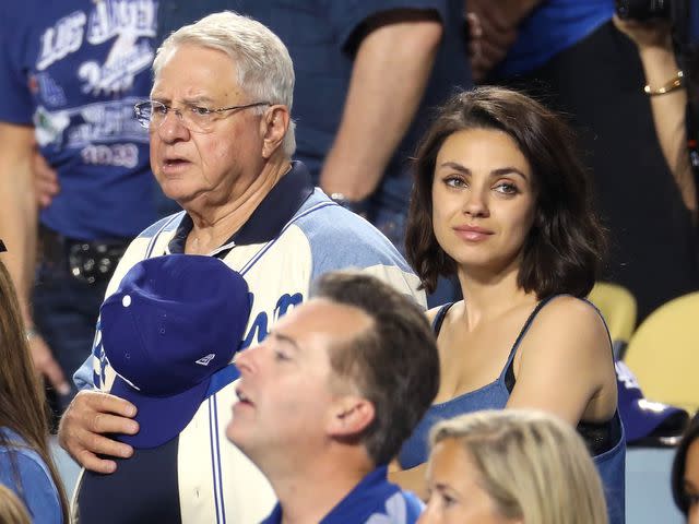<p>Jerritt Clark/Getty </p> Mila Kunis and her father Mark attend The 2017 World Series - Game 2 at Dodger Stadium