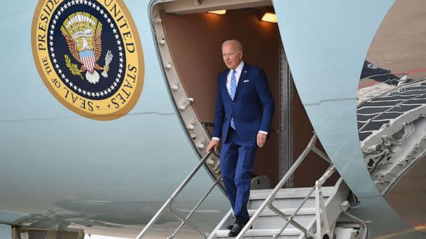 PHOTO: President Joe Biden steps off Air Force One upon arrival at Des Moines International Airport in Des Moines, Iowa, April 12, 2022. (Mandel Ngan/AFP via Getty Images)