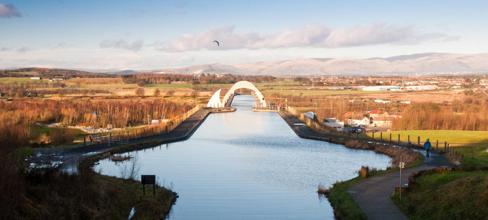 Falkirk, Scotland - January 22, 2012: The junction of the Forth and Clyde Canal and the Union Canal at Falkirk, with the mountains of Stirling beyond.