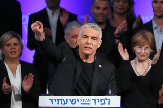 Yair Lapid, chairman of Israel’s Yesh Atid party, presents his electoral list this week (AFP/Getty)