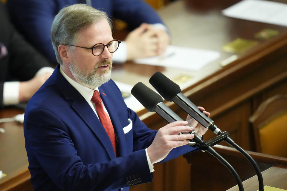 Czech Republic's Prime Minister Petr Fiala holds a speech at the Parliament in Prague, Czech Republic, Wednesday, June 15, 2022. The Russian military aggression against Ukraine and what Europe has to do to cope with the shockwaves it has caused have become the key task for the forthcoming Czech Republic's presidency of the 27-nation bloc. "Europe and the whole world have been undergoing an essential change," Prime Minister Petr Fiala said on Wednesday when he introduced his country's priorities to reporters. (AP Photo/Petr David Josek)