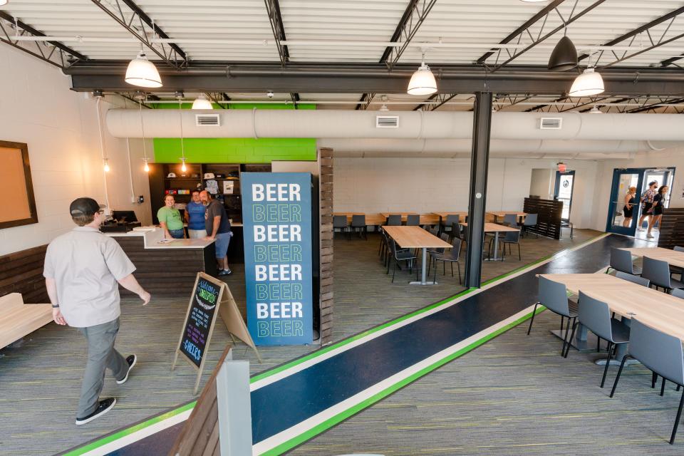 The dining room at SingleSpeed Brewing Co. in Des Moines is just inside the entrance. Follow the painted path to reach the bar area.