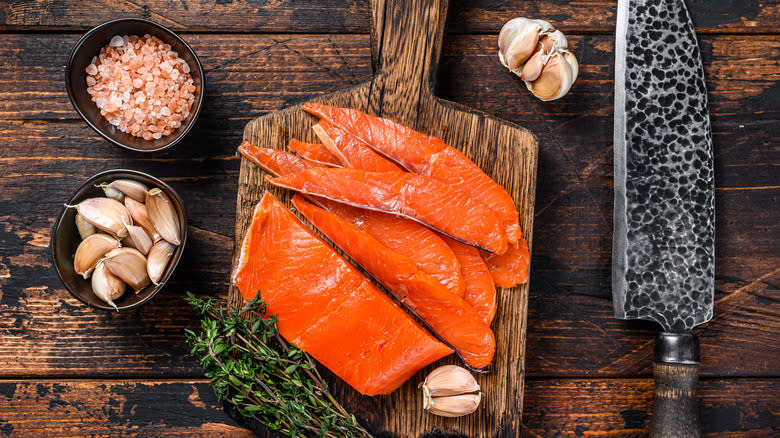 Cured salmon fillets on wood