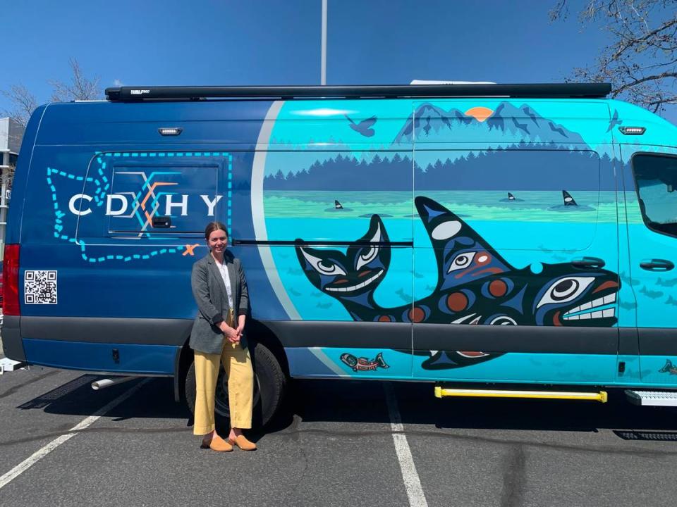 The Educational Service District 123 Director of Audiology, Betsy Schluge, stands in front of the new mobile audiology lab outside the ESD main campus in Pasco, Wash. She drives the van to 23 different Eastern Washington school districts to offer testing and resources to children in underserved areas.