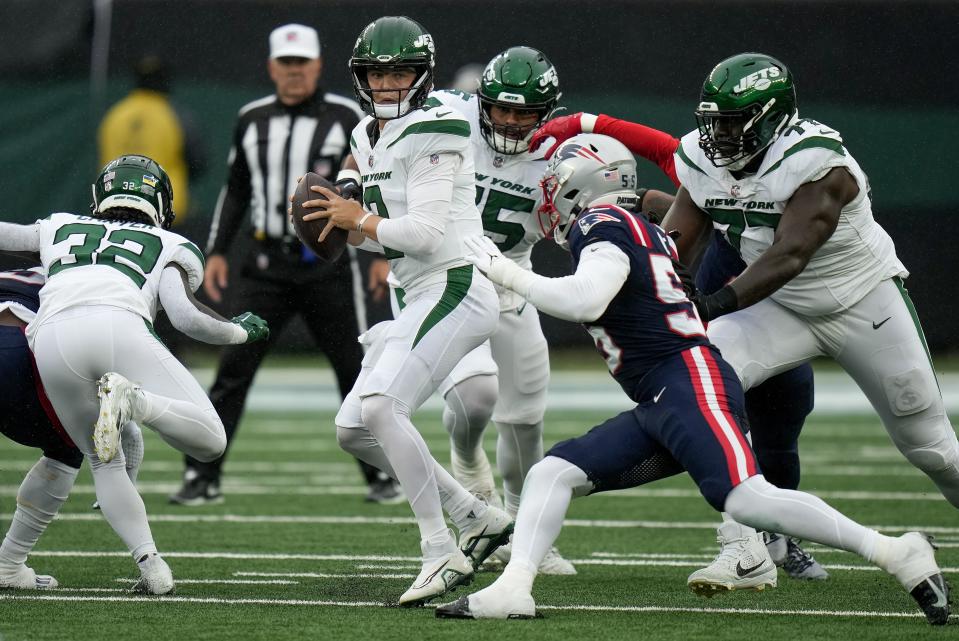 New York Jets quarterback Zach Wilson (2) is sacked by the New England Patriots during the first quarter of an NFL football game, Sunday, Sept. 24, 2023, in East Rutherford, N.J. | Seth Wenig, Associated Press