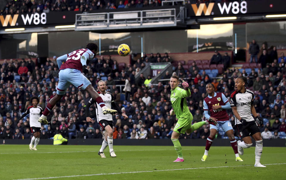 Burnley's David Datro Fofana, left, scores their side's first goal of the game during their English Premier League soccer match against Fulham at Turf Moor, Burnley, England, Saturday, Feb. 3, 2024. (Jess Hornby/PA via AP)