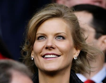 FILE PHOTO - Dubai International Capital's chief negotiator Amanda Staveley smiles before the Champions League semi-final first leg soccer match between Liverpool and Chelsea at Anfield in Liverpool, northern England, April 22, 2008. REUTERS/Phil Noble/File Photo