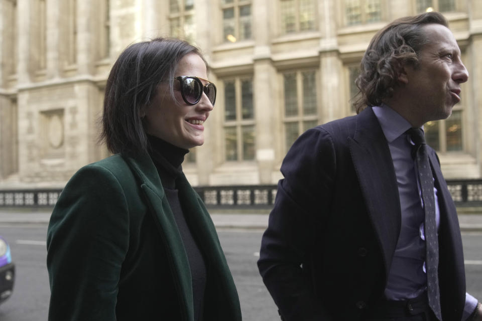 Actress Eva Green arrives at the High Court in London, Monday, Jan. 30, 2023. A lawyer for Eva Green on Thursday, Jan. 26, 2023 accused producers of a collapsed film of trying to damage the performer's reputation by depicting her as a "diva." The French actress, who played Vesper Lynd in James Bond thriller "Casino Royale," is suing producers for a $1 million fee she says she is owed for "A Patriot." (AP Photo/Kin Cheung)