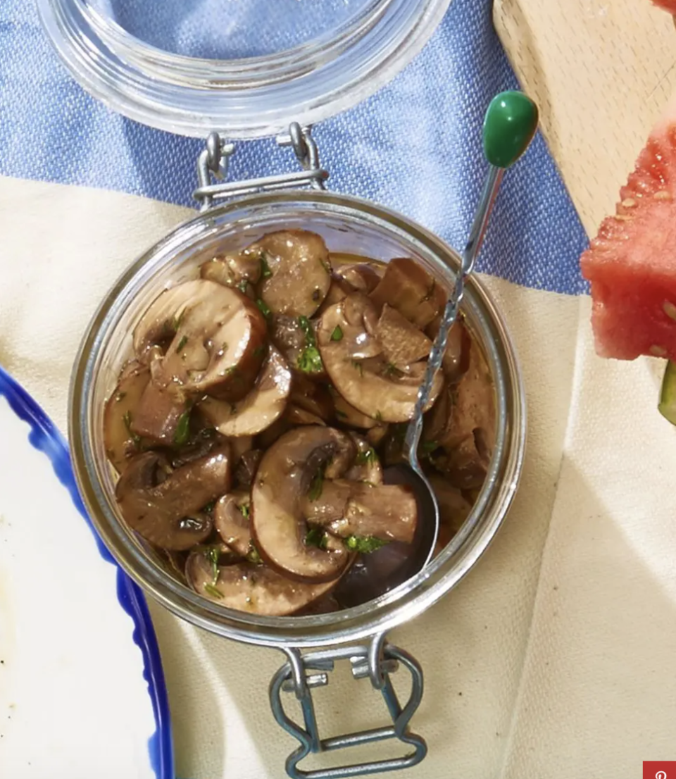 <p>Marinated in a sweet n tangy dressing, these 'shrooms can dress up any boring burger.</p><p>Get the <strong><a href="https://www.goodhousekeeping.com/food-recipes/easy/a21752621/marinated-mushrooms-recipe/" rel="nofollow noopener" target="_blank" data-ylk="slk:Marinated Mushrooms recipe;elm:context_link;itc:0;sec:content-canvas" class="link ">Marinated Mushrooms recipe</a></strong><em>.</em></p><p><strong>RELATED: </strong><a href="https://www.goodhousekeeping.com/food-recipes/g1553/burger-recipes/" rel="nofollow noopener" target="_blank" data-ylk="slk:33 Unique, Homemade Burger Recipes to Cook on Repeat;elm:context_link;itc:0;sec:content-canvas" class="link ">33 Unique, Homemade Burger Recipes to Cook on Repeat</a><br></p>