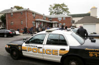 Police are pictured in front of what according to local media is the apartment of Sayfullo Saipov, the suspect in the New York City truck attack in Paterson, New Jersey, U.S., November 1, 2017. REUTERS/Ashlee Espinal