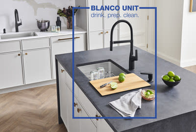 Pictured: RIVANA Semi-pro Faucet and RIVANA Soap Dispenser in Matte Black with the QUATRUS R15.  Accessories include Ash Cutting Board and Elevated Grid.