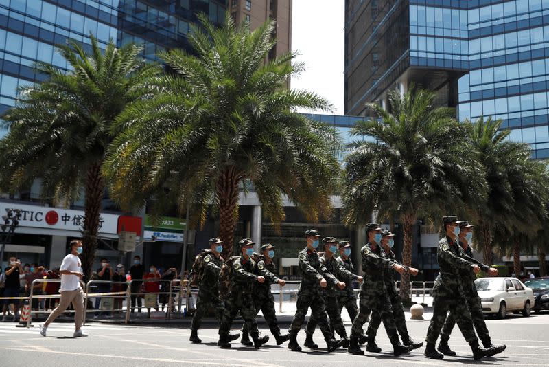 Tight security outside U.S. Chengdu consulate as staff inside prepare to leave, after China ordered its closure in response to U.S. order for China to shut its consulate in Houston