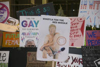 <p>A shrine of discarded signs featuring President Donald Trump from the Women’s March in New York City on Jan. 21, 2017. (Photo: Gordon Donovan/Yahoo News) </p>