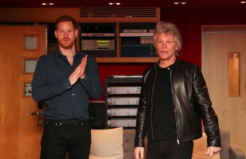 Britain's Prince Harry meets Jon Bon Jovi at Abbey Road Studios in London
