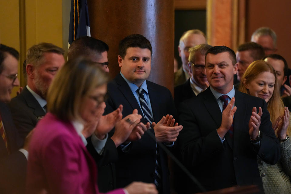 On Jan. 24, 2023, Gov. Kim Reynolds thanks Speaker of the Iowa House Pat Grassley, R-New Hartford, left, and Senate Majority Leader Jack Whitver, R-Grimes, for gaining speedy passage of House File 68, providing taxpayer-funded scholarships to private school students.