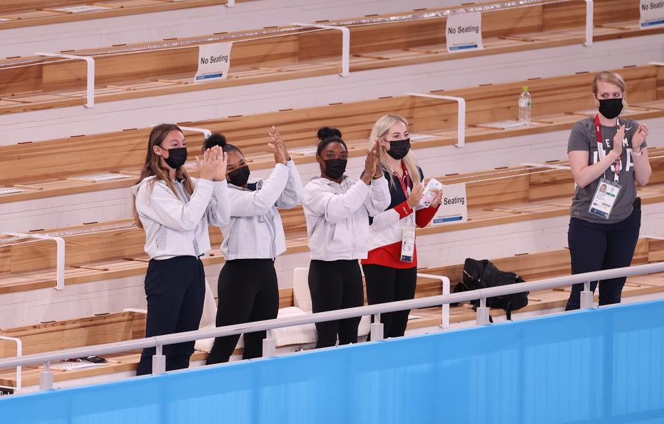 Grace McCallum, Jordan Chiles, Simone Biles and Mykayla Skinner, of Team United States, cheer after Sunisa Lee wins the gold medal in the Women’s all-around final (Getty)