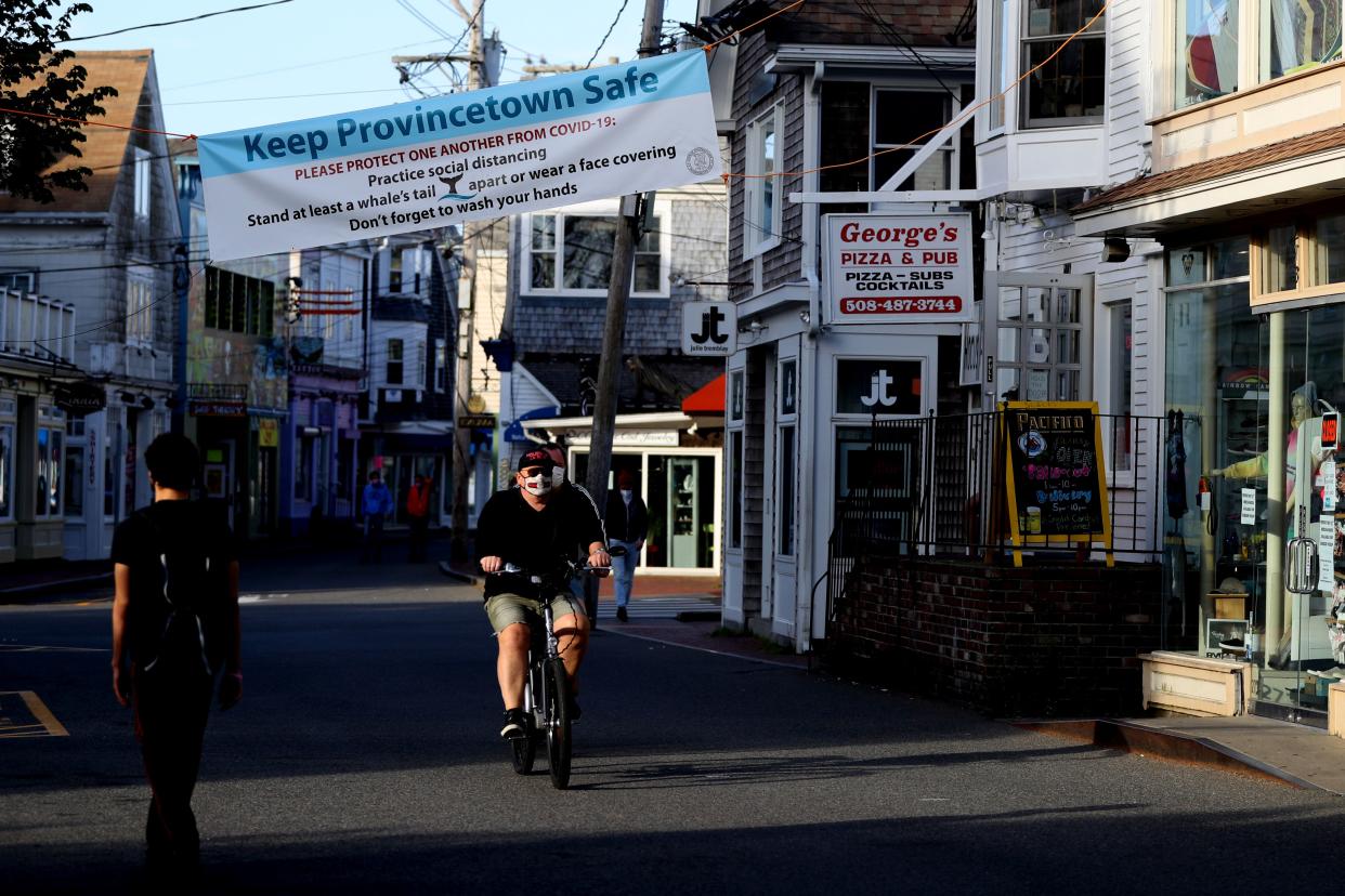 A biker rides down Commercial Street on May 25, 2020 in Provincetown, Massachusetts. 