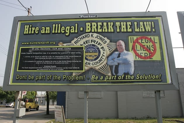 A billboard about undocumented immigrants north of Cincinnati (David Kohl/AP)