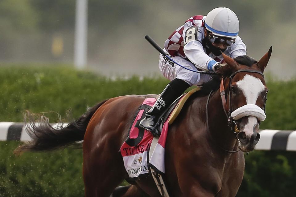 Tiz The Law and jockey Manny Franco approach the finish line en route to an easy victory in the Belmont Stakes.