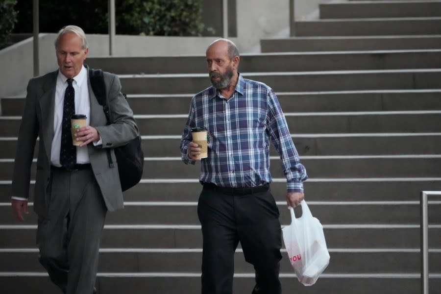 FILE – Defendant Jerry Boylan, captain of the Conception, right, arrives at federal court in Los Angeles, Wednesday, Oct. 25, 2023. The scuba dive boat captain is scheduled to be sentenced by a federal judge Thursday, May 2, 2024, on a conviction of criminal negligence after 34 people died in a fire aboard the vessel nearly five years ago. (AP Photo/Damian Dovarganes, File)