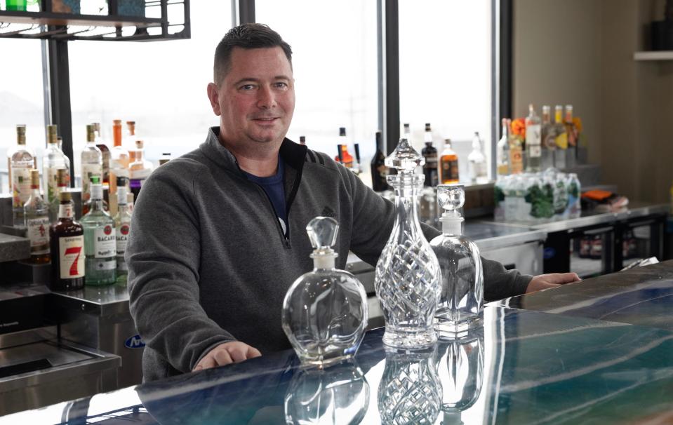 John Schulte, director of operations, behind the third-floor bar at The Beach Gallery in Keansburg.