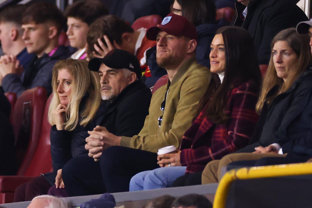 Burnley chairman Alan Pace (center left) alongside his wife Kristen Pace (left) JJ (center right) and Kealia Watt (right) during the Premier League match between Burnley FC and Everton FC at Turf Moor on Dec. 16, 2023, in Burnley, United Kingdom.