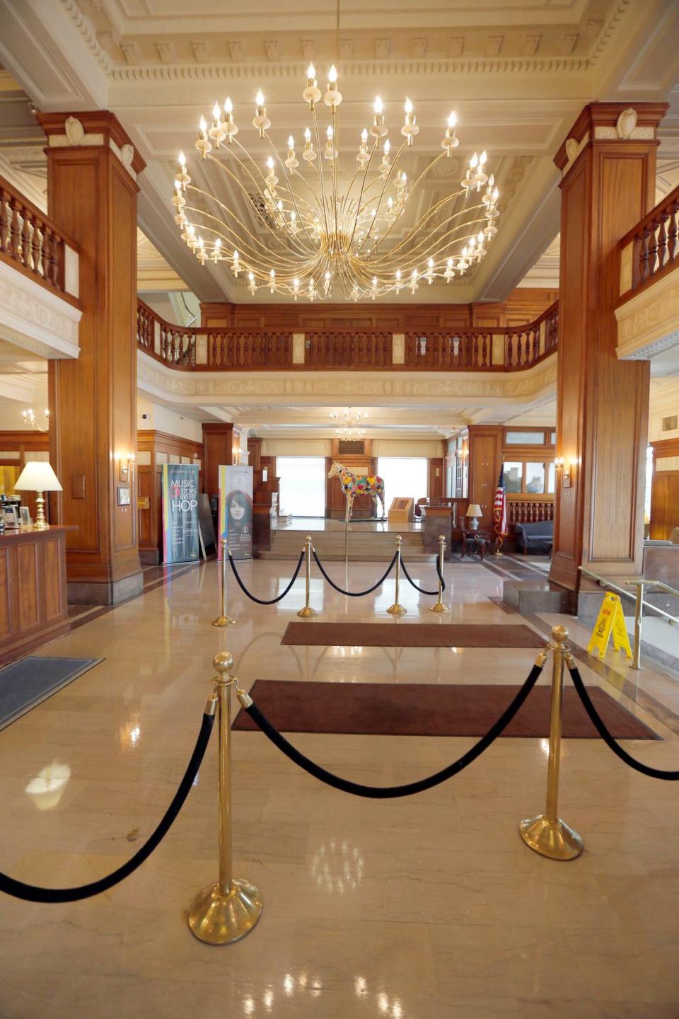 The lobby of the Lexington-Fayette Urban County Government Center includes a large chandelier, left over from its days as a hotel.