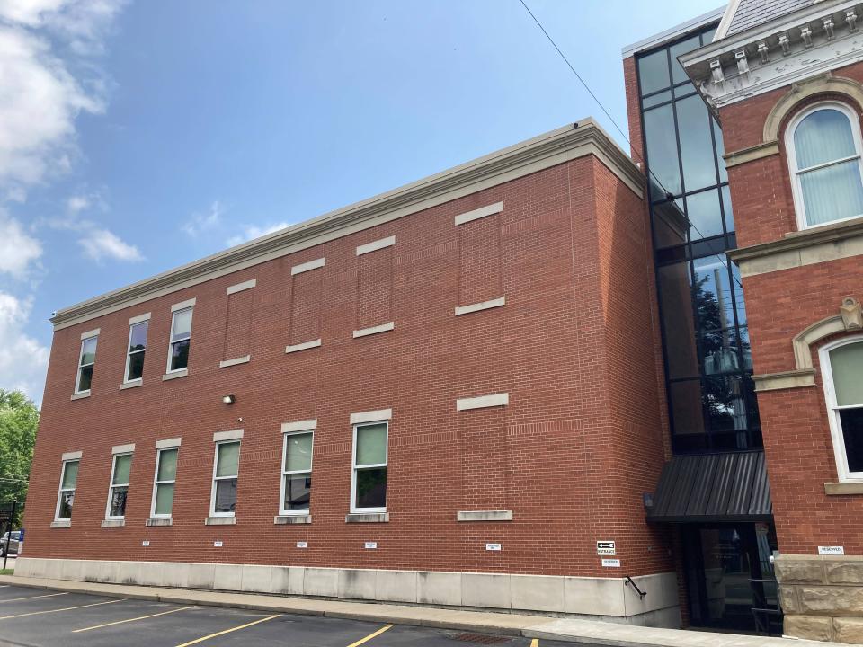 Pictured is the west side of the Warren County Courthouse in Warren County, Pennsylvania, where authorities say Michael C. Burham rappelled down from the roof using bedsheets tied together on July 6. He went down the area to the right, with the large windows, authorities said.
