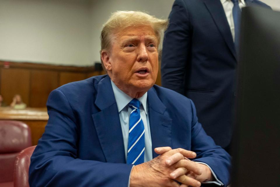Former US President Donald Trump attends the second day of his trial for allegedly covering up hush money payments linked to extramarital affairs, at Manhattan Criminal Court in New York City on April 16, 2024.