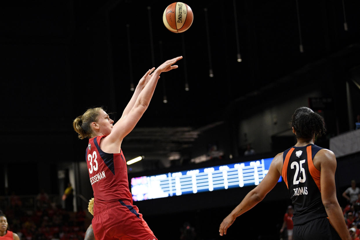 Washington Mystics center Emma Meesseman (33) shoots against Connecticut Sun forward Alyssa Thomas (25) in the second half of Game 2 of basketball's WNBA Finals, Tuesday, Oct. 1, 2019, in Washington. The Sun won 99-87. (AP Photo/Nick Wass)